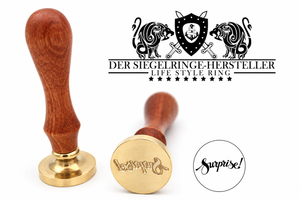 Surprise Siegelstempel mit Holzgriff und Messingkopf, Motivansicht