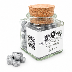 Siegelwachs-Drops silber im Glas mit Korkverschluss auf weißem Hintergrund